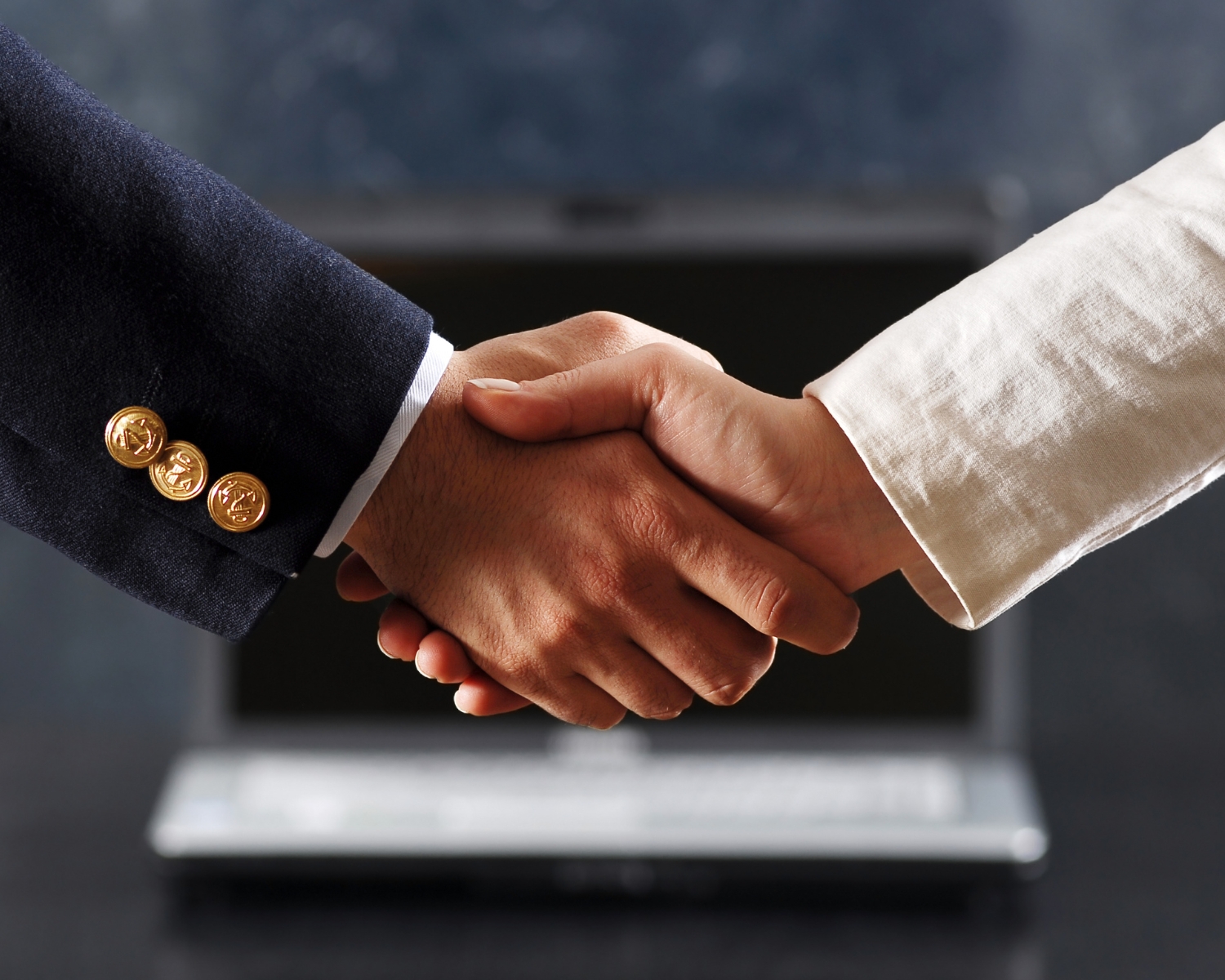 Hand shake -Contact Us